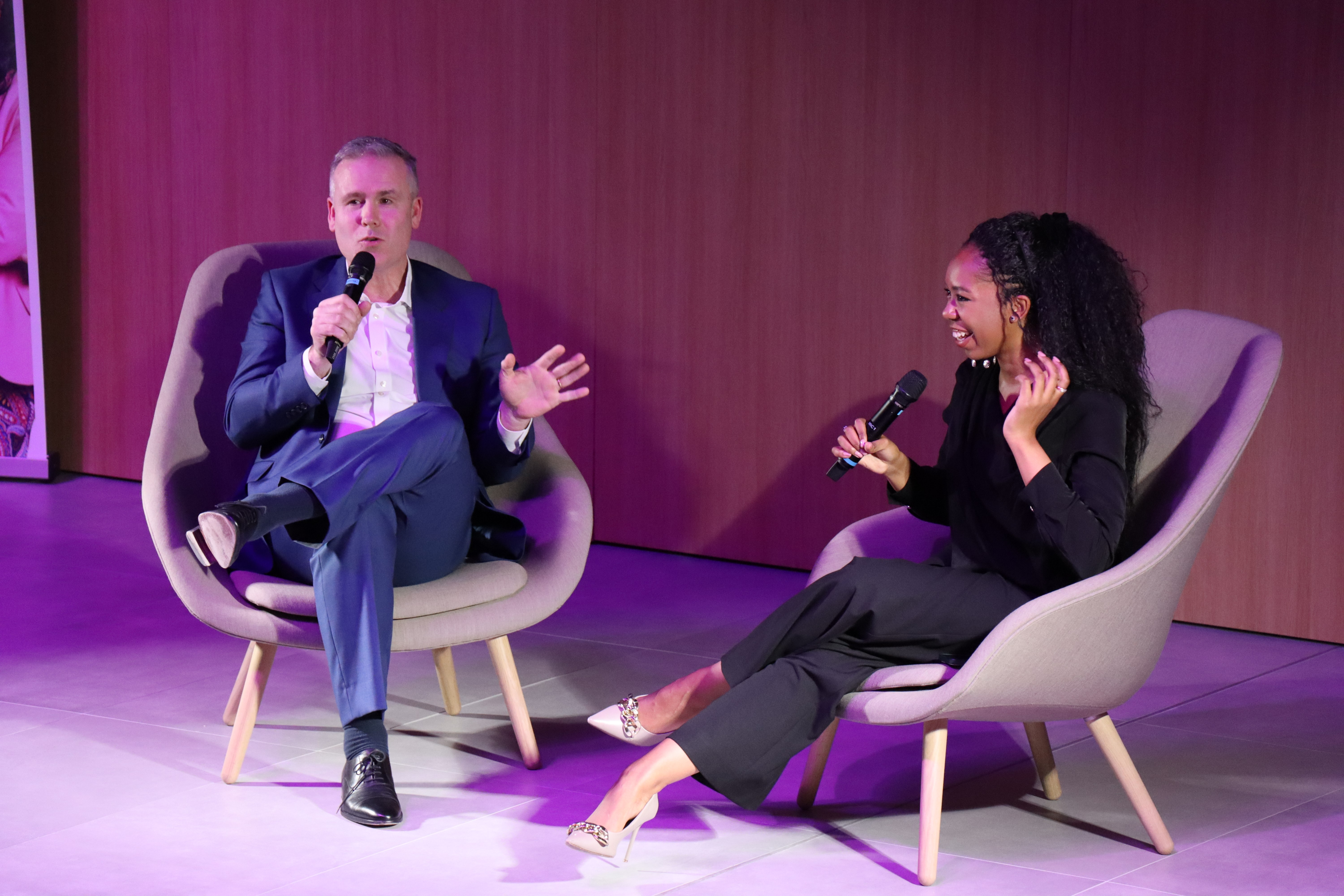 Image shows George Williamson, CEO of HMGCC and Lakechia Jeanne, Girls in Science founder, seated and in conversation